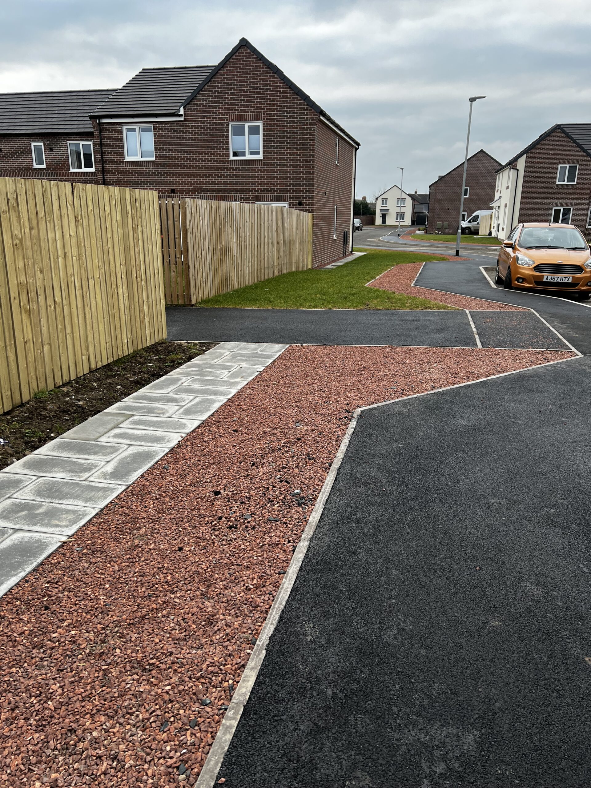 Example of a pavement, service strip and flagging works on residential site