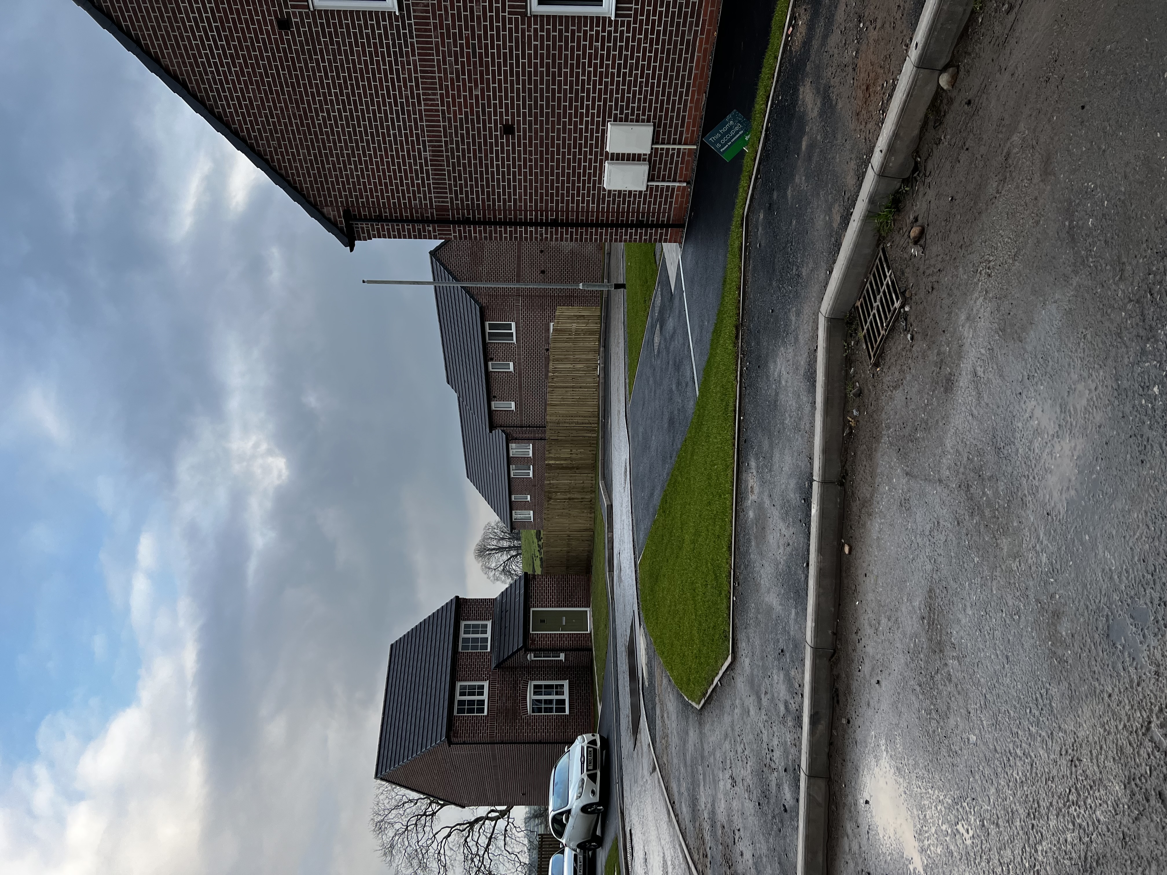 Road kerbs, pavements at Chimes Bank